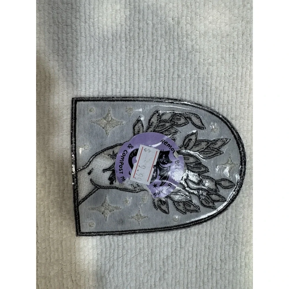 Metamorphosis Iron On Patch